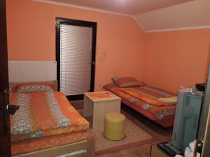 Postel nebo postele na pokoji v ubytování Rooms Violeta
