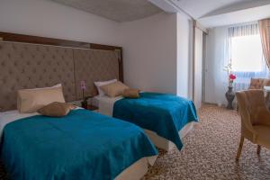 Letto o letti in una camera di New Hotel