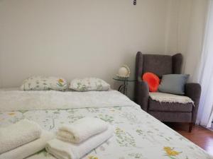 Katil atau katil-katil dalam bilik di Apartment White Lily of Budva