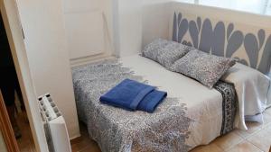 Ein Bett oder Betten in einem Zimmer der Unterkunft Maribel Ski