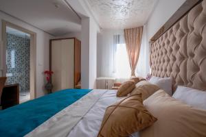 Letto o letti in una camera di New Hotel