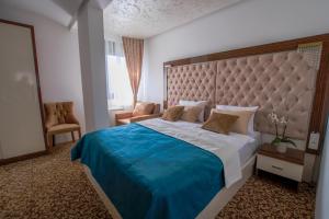 Letto o letti in una camera di New Hotel