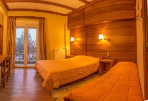 Postelja oz. postelje v sobi nastanitve Hotel Steni