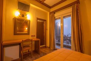 Postelja oz. postelje v sobi nastanitve Hotel Steni