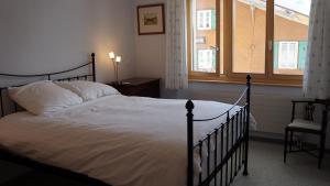 En eller flere senge i et værelse på Chalet Bella Vista 1