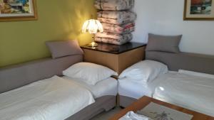 Postel nebo postele na pokoji v ubytování Apartments Šorić