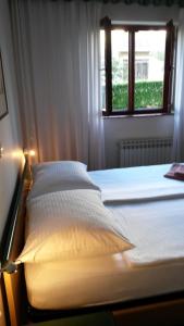 Postel nebo postele na pokoji v ubytování Apartments Šorić