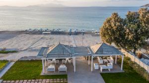 an aerial view of a gazebo and the beach at Kordistos Hotel in Kefalos