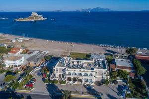 an aerial view of a town and the ocean at Kordistos Hotel in Kefalos