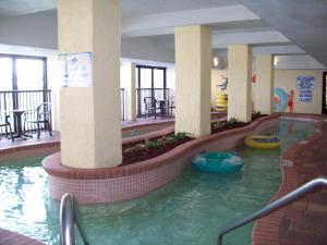 a pool in the middle of a hotel lobby at Sea Crest Oceanfront Resort in Myrtle Beach
