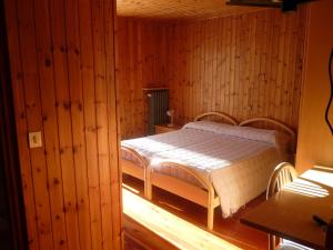 Postel nebo postele na pokoji v ubytování Hotel Fior di Roccia