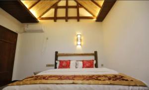 Postel nebo postele na pokoji v ubytování Tian Jia Xiao Yuan Boutique Homestay
