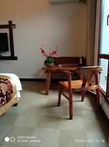 Un lugar para sentarse en Tian Jia Xiao Yuan Boutique Homestay