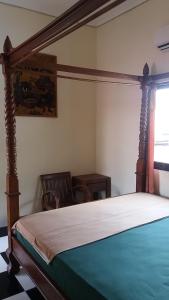 La Javanaise Home Stay Malioboro 객실 침대