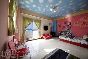 Postel nebo postele na pokoji v ubytování Green island Breeze Homestay