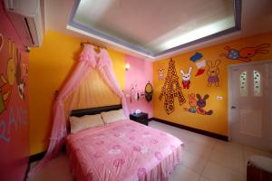 Postel nebo postele na pokoji v ubytování Green island Breeze Homestay