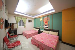 Postel nebo postele na pokoji v ubytování Green island Breeze Homestay