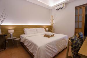 Postel nebo postele na pokoji v ubytování VIYA lodge