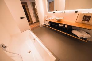 Baðherbergi á Hotel Adlernest