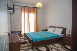En eller flere senger på et rom på Margarita & Filippos Apartments Corfu