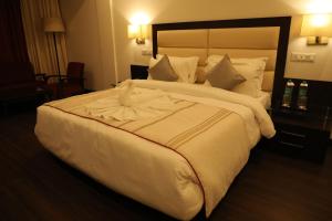 Hotel Natraj Rishikesh客房内的一张或多张床位