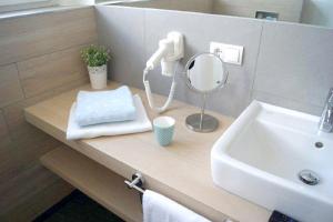 Ein Badezimmer in der Unterkunft Belle Maison - Das kleine Hotel