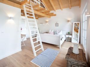 Ein Bett oder Betten in einem Zimmer der Unterkunft Belle Maison - Das kleine Hotel