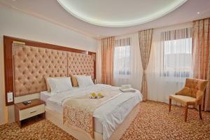 Postel nebo postele na pokoji v ubytování New Hotel