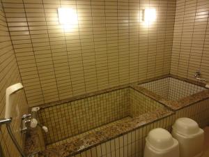 Koupelna v ubytování Miyajima Hotel Makoto