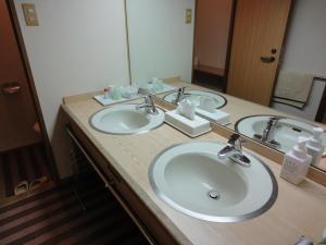 Koupelna v ubytování Miyajima Hotel Makoto + 30 fotografií