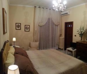 Postel nebo postele na pokoji v ubytování Rosa dei Venti B&B