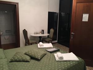 Postel nebo postele na pokoji v ubytování Casa Dolce