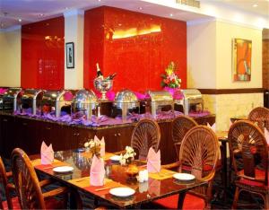 Restoranas ar kita vieta pavalgyti apgyvendinimo įstaigoje Jianguo Hotspring Hotel