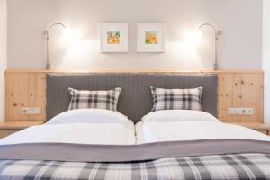 Posteľ alebo postele v izbe v ubytovaní Hotel Gasthof Zum Kirchenwirt