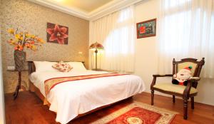 Postel nebo postele na pokoji v ubytování Nature House Homestay