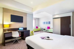 A television and/or entertainment centre at ibis Styles Sharjah