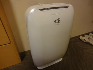 a toilet in the corner of a room at Hotel Route-Inn Hakata Ekimae -Hakataguchi- in Fukuoka