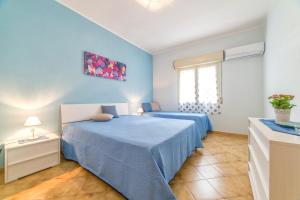 Posteľ alebo postele v izbe v ubytovaní Selinunte's Home