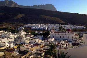 an aerial view of a city with white buildings at Casa Lola in Agaete