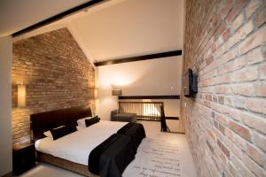 Łóżko lub łóżka w pokoju w obiekcie Hotel Remes