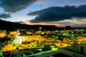 a view of a city at night at Casa Lola in Agaete