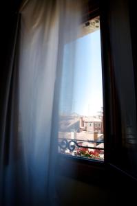 A balcony or terrace at Hotel Al Codega