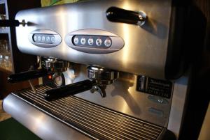 a coffee maker sitting on top of a counter at Zöchbauer Gästehaus - Hotel Garni in Kapelln