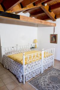 Voodi või voodid majutusasutuse Villa Scalabrini toas