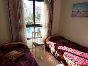 Posteľ alebo postele v izbe v ubytovaní GEMELOS 26 APARTMENTS - Benidormland