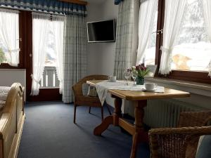 Posezení v ubytování Gästehaus Pointner