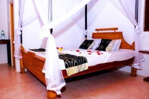 Llit o llits en una habitació de Turtle Watch Cabana