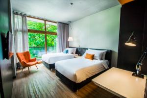 Postel nebo postele na pokoji v ubytování Five Hotel & Residences