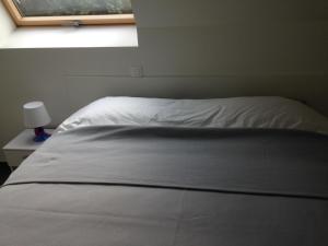 Een bed of bedden in een kamer bij walhofpark nr 25