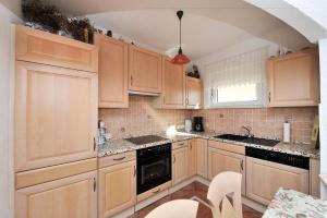 Kuchyň nebo kuchyňský kout v ubytování Apartment Božena